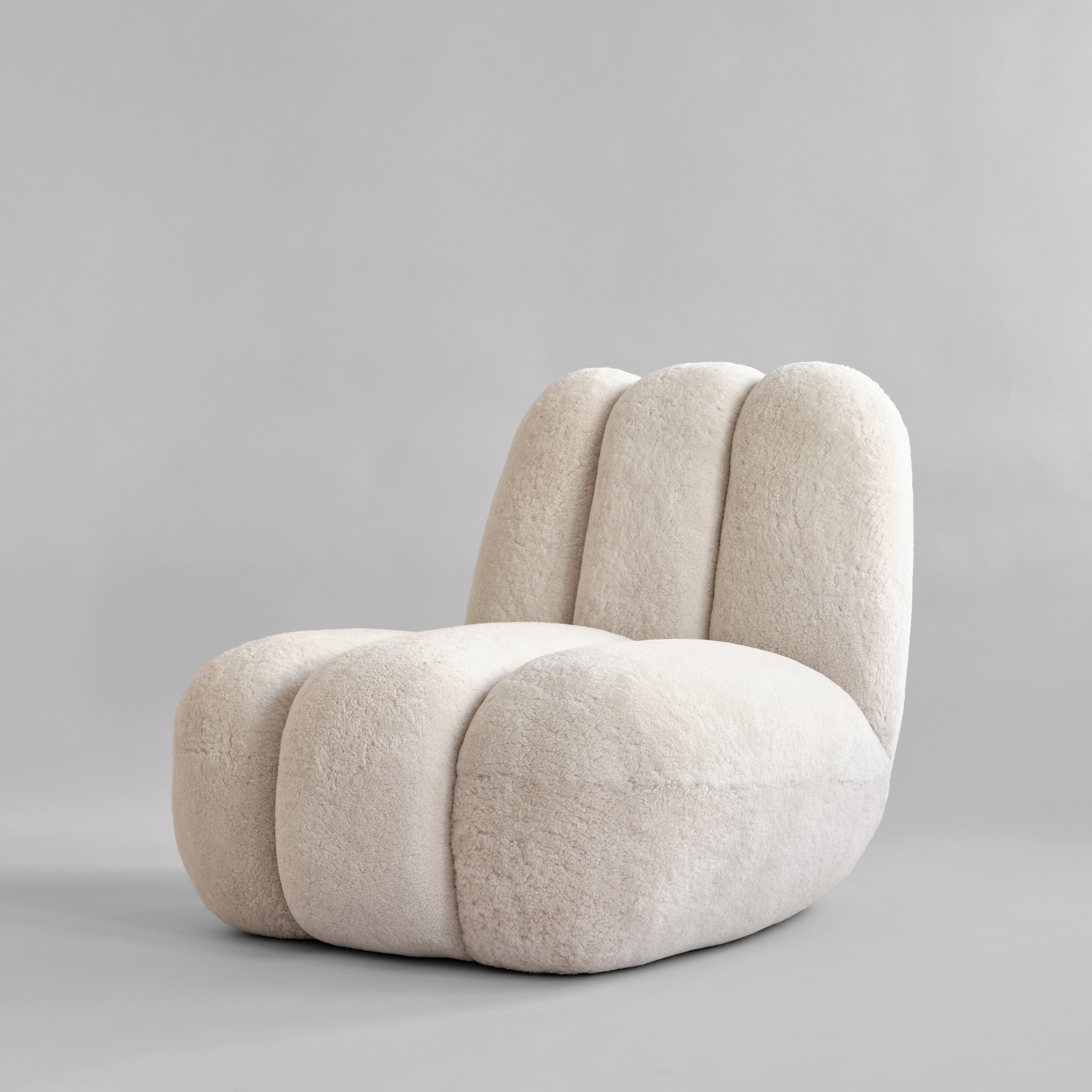 101-copenhagen-toe-chair-sandshell-schaffell-loungesessel image 7