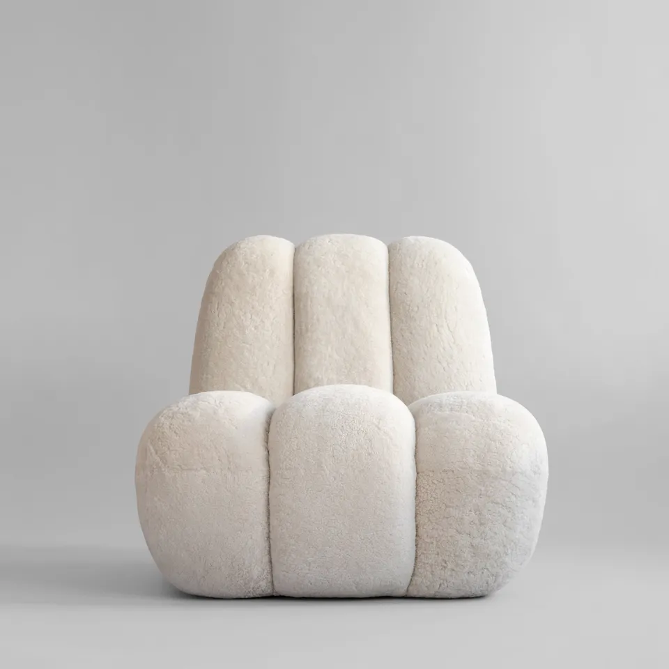 101-copenhagen-toe-chair-sandshell-schaffell-loungesessel image 1