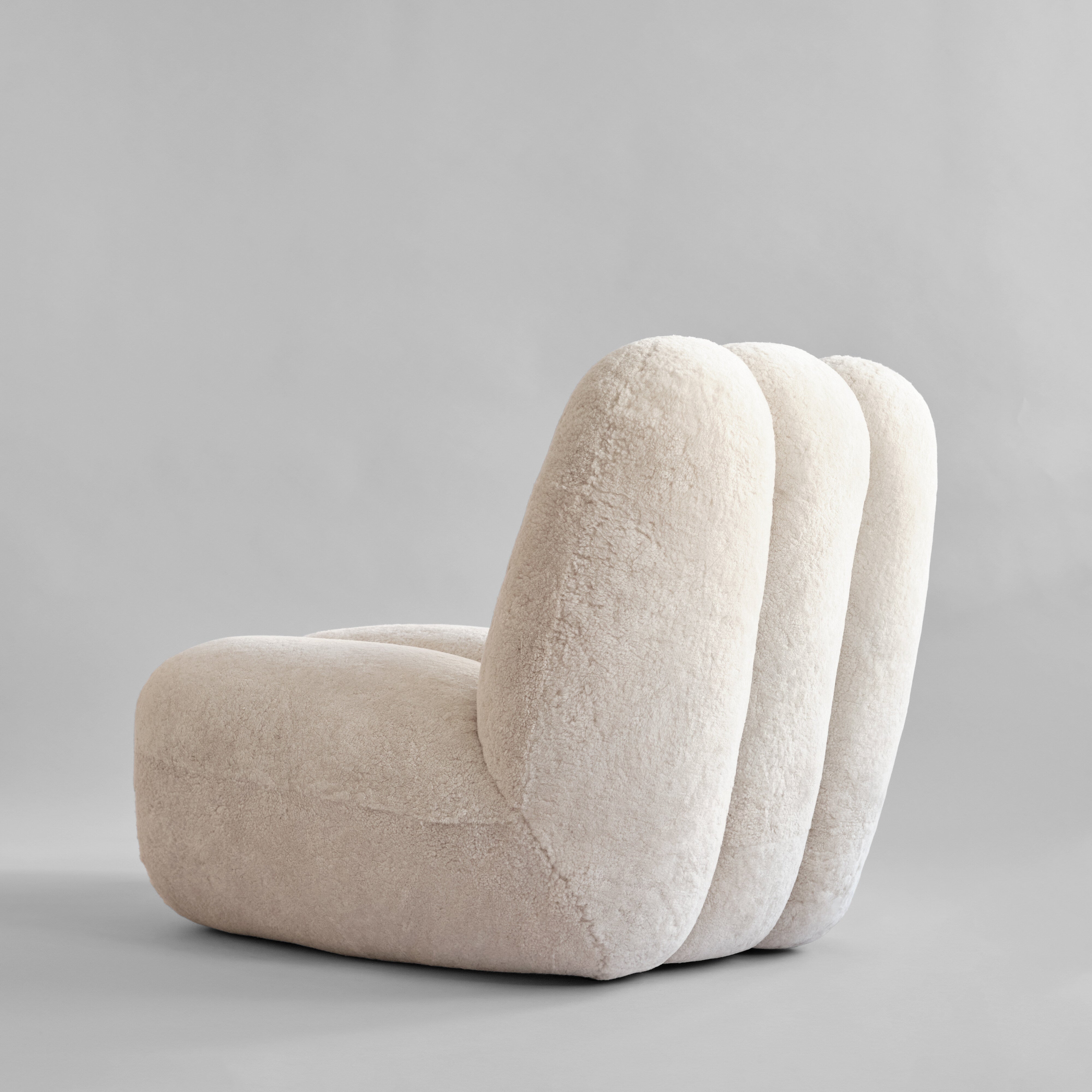 101-copenhagen-toe-chair-sandshell-schaffell-loungesessel image 5