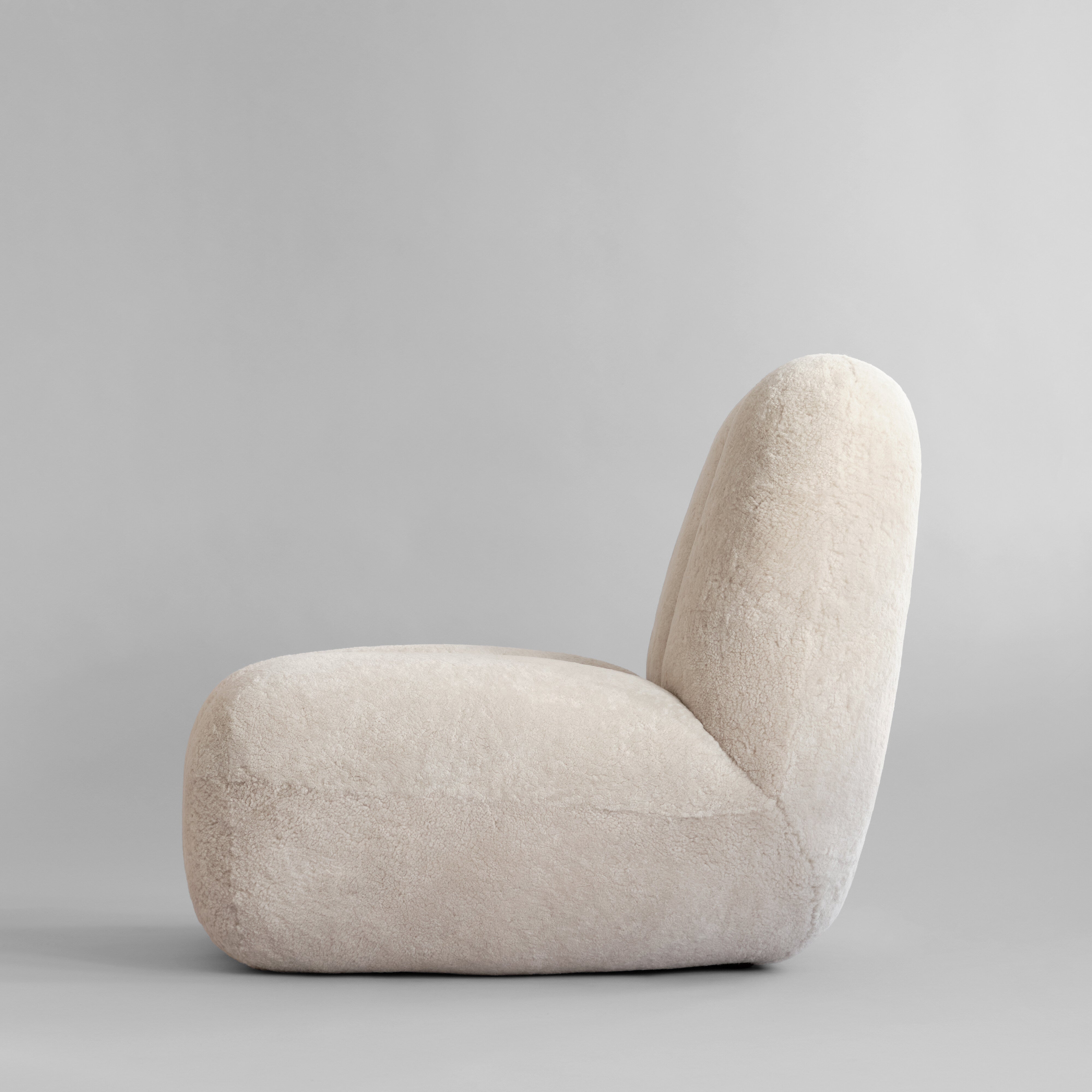 101-copenhagen-toe-chair-sandshell-schaffell-loungesessel image 4